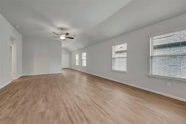 a kitchen with stainless steel appliances granite countertop a stove top oven and sink
