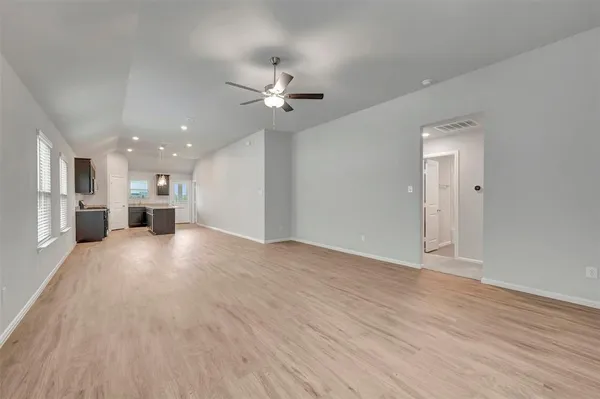 a view of an empty room and window