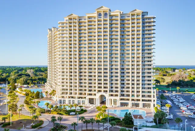 a front view of a building with outdoor space