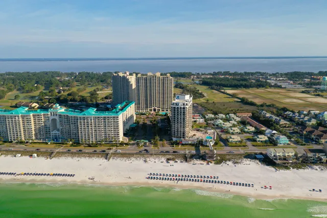 a view of swimming pool with outdoor seating and yard in back