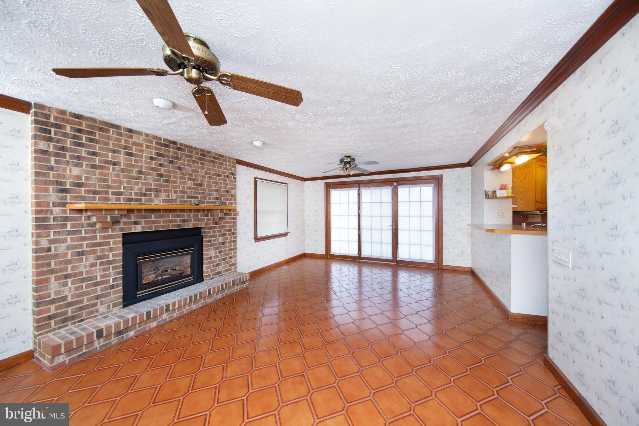 6831 Queens Ferry Road Baltimore, MD 21239 - Photo 2 of 30 Family Room with Gas Fireplace