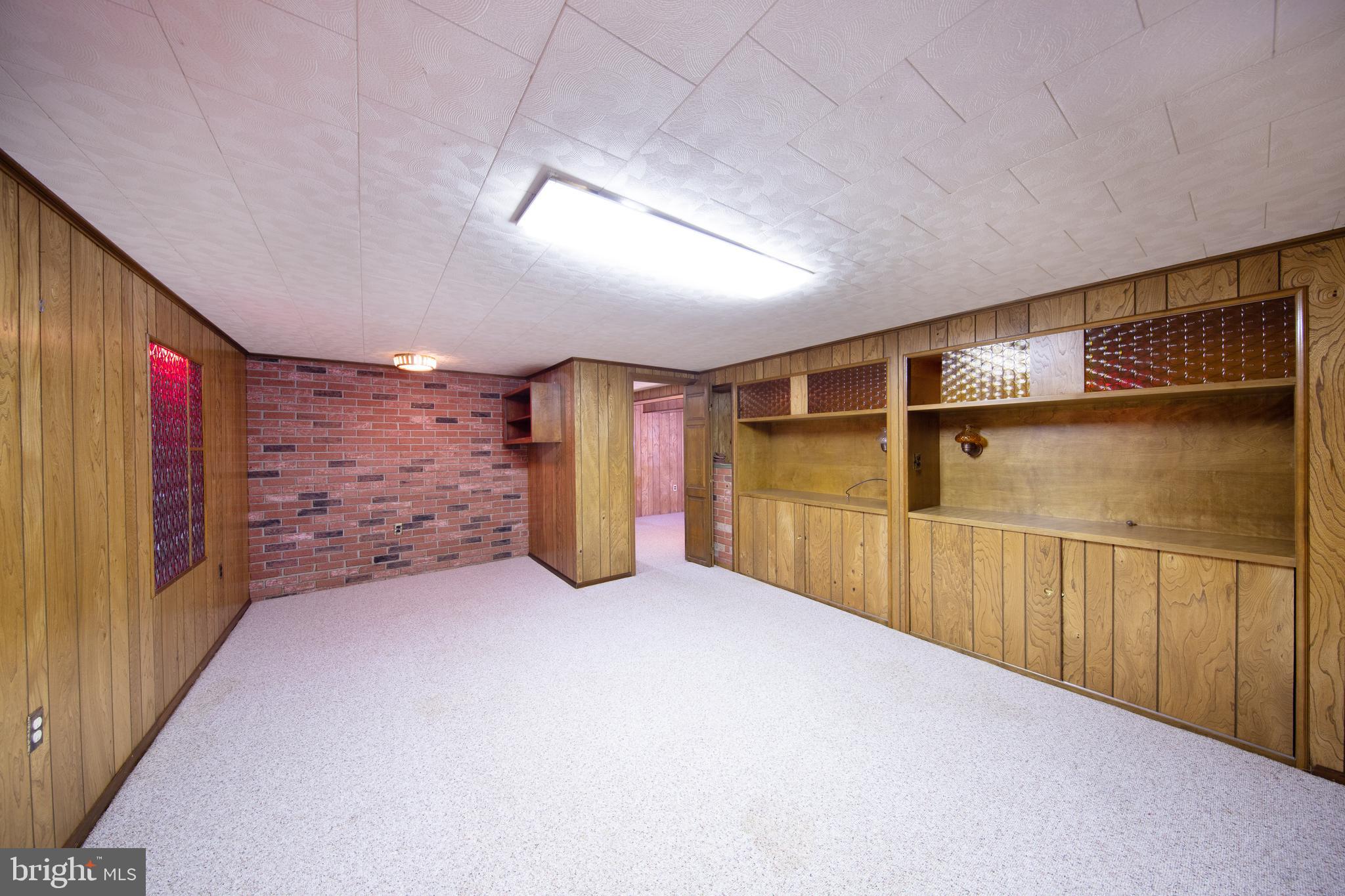 6831 Queens Ferry Road Baltimore, MD 21239 - Photo 21 of 30 Lower Level Den