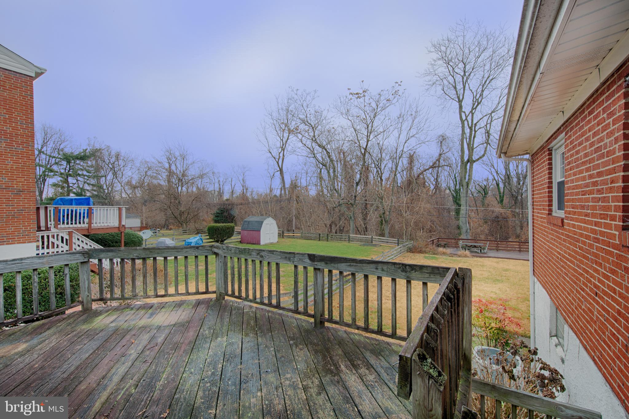 6831 Queens Ferry Road Baltimore, MD 21239 - Photo 27 of 30 Deck to Back Yard