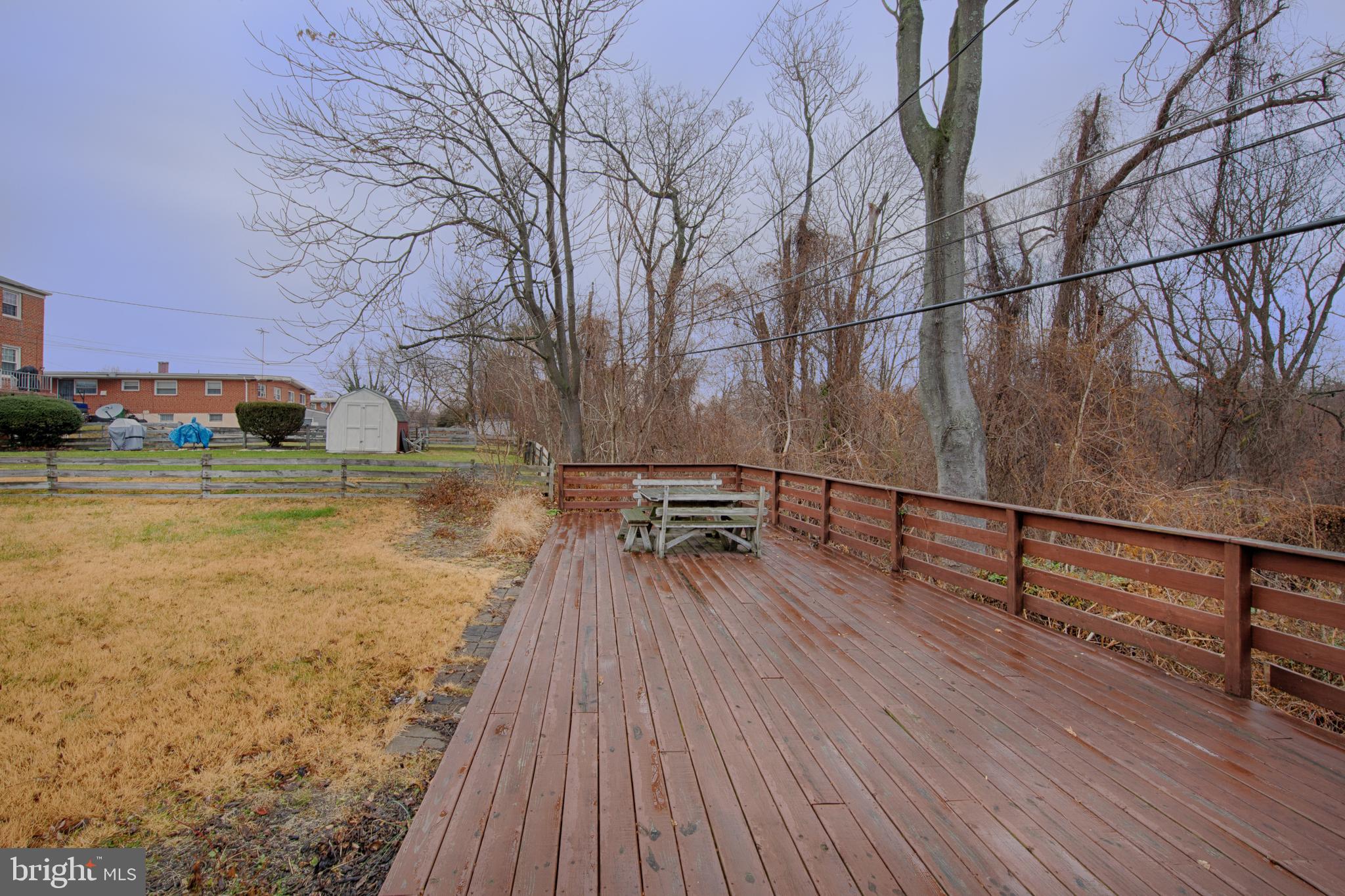 6831 Queens Ferry Road Baltimore, MD 21239 - Photo 29 of 30 Deck at the End of the Back Yard