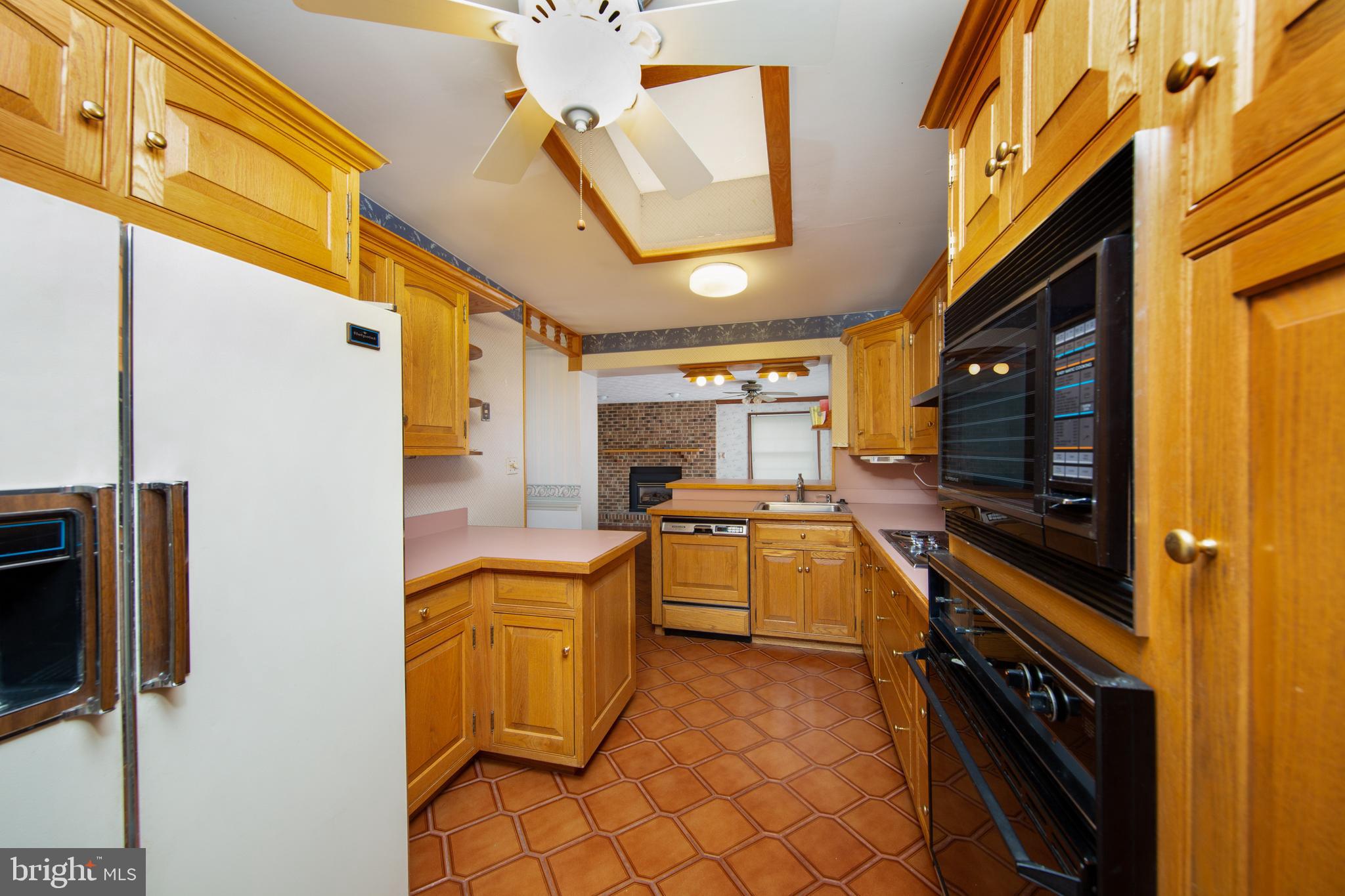 6831 Queens Ferry Road Baltimore, MD 21239 - Photo 4 of 30 Kitchen with Ceiling Fan