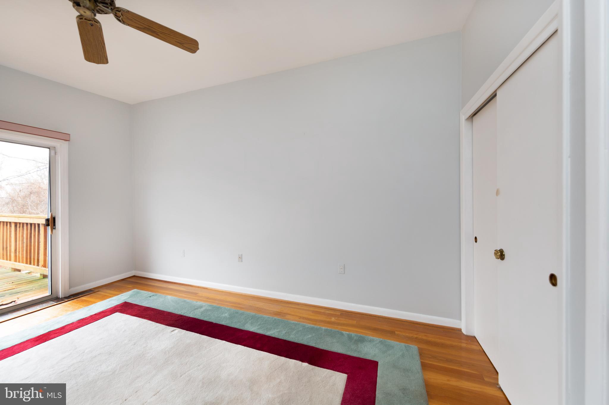 6831 Queens Ferry Road Baltimore, MD 21239 - Photo 10 of 30 Master Bedroom with Hardwood Flooring