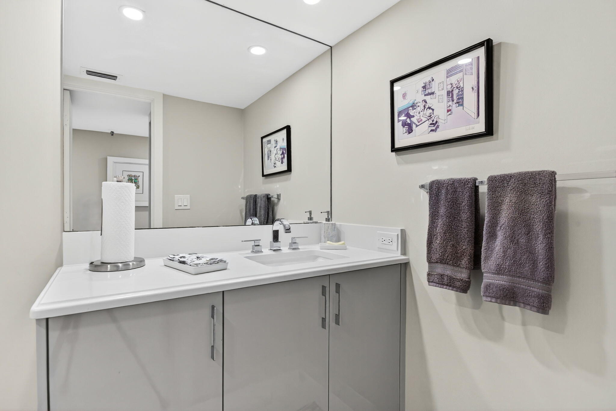 7186 Promenade Drive, Unit 701 Boca Raton, FL 33433 - Photo 34 of 39 a bathroom with a sink and a mirror