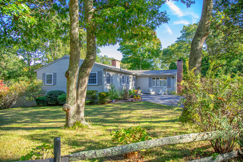 2 Fuller Road Centerville, MA 02632 - Photo 2 of 26 a front view of house with yard space and swimming pool