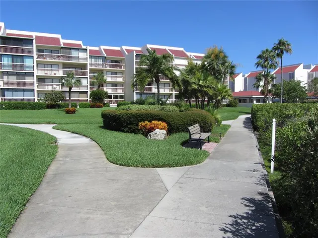 a garden view with a fountain