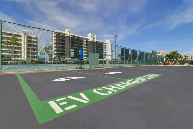 a swimming pool with outdoor seating and yard