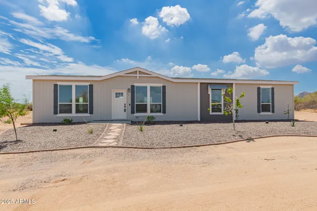 a view of a house with a patio