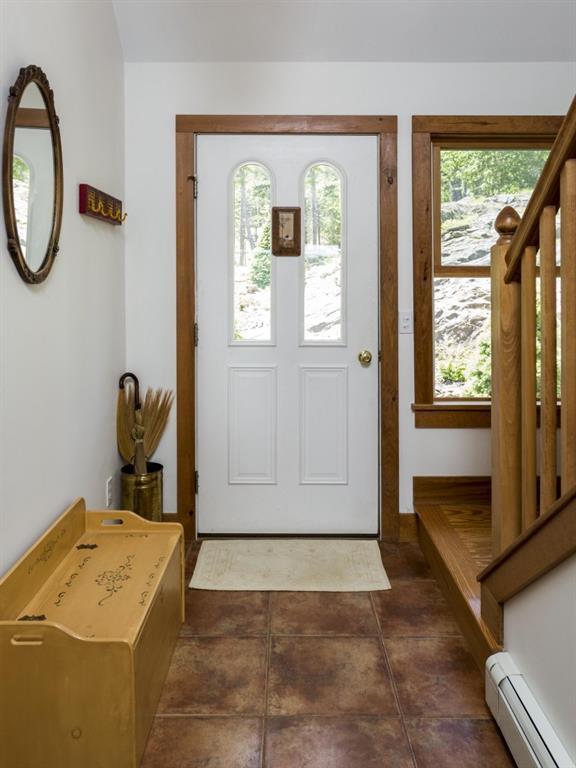 189 Steves Road Boothbay, ME 04537 - Photo 6 of 35 The foyer with closet and tile flooring