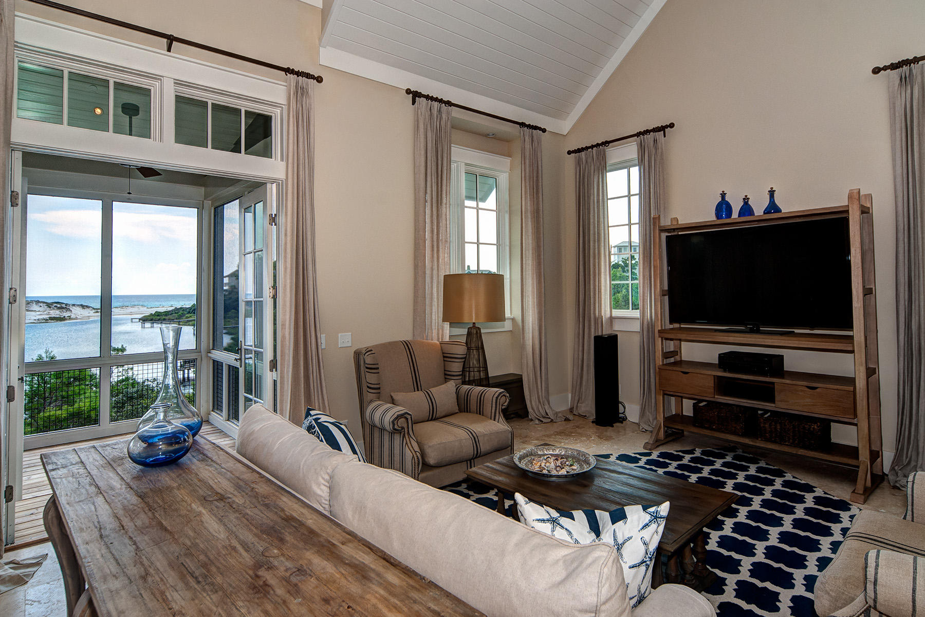 33 Bluff Lane Santa Rosa Beach, FL 32459 - Photo 2 of 37 a living room with furniture and a flat screen tv