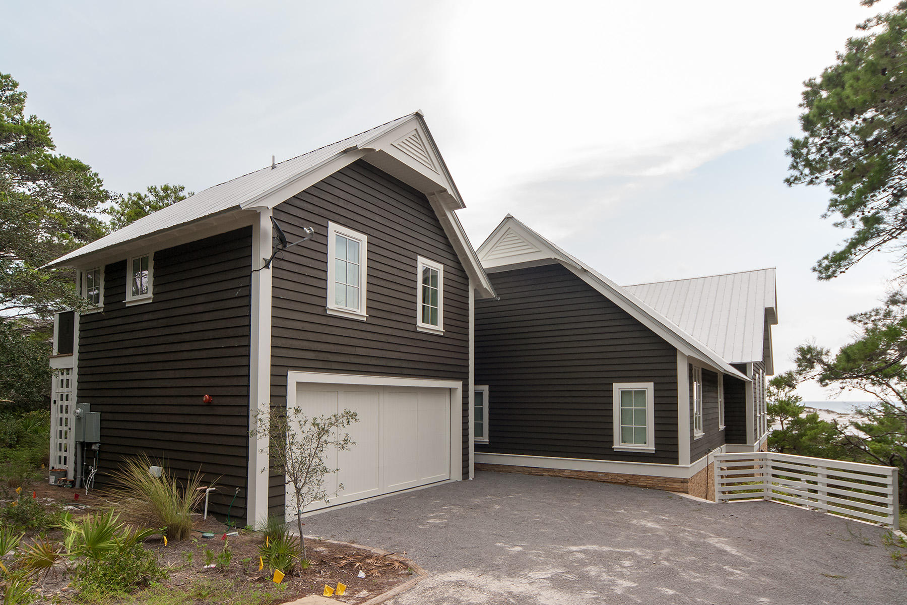 33 Bluff Lane Santa Rosa Beach, FL 32459 - Photo 25 of 37 a front view of a house with garage