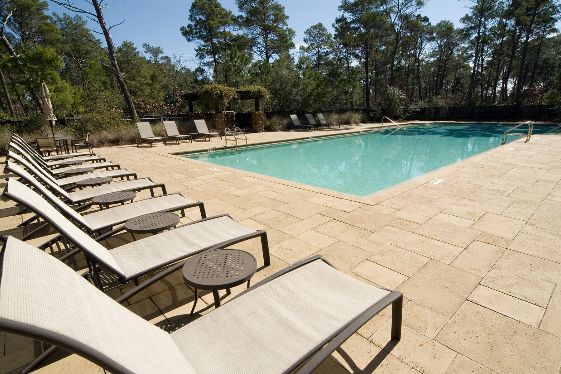 33 Bluff Lane Santa Rosa Beach, FL 32459 - Photo 36 of 37 a view of a swimming pool with lounge chairs
