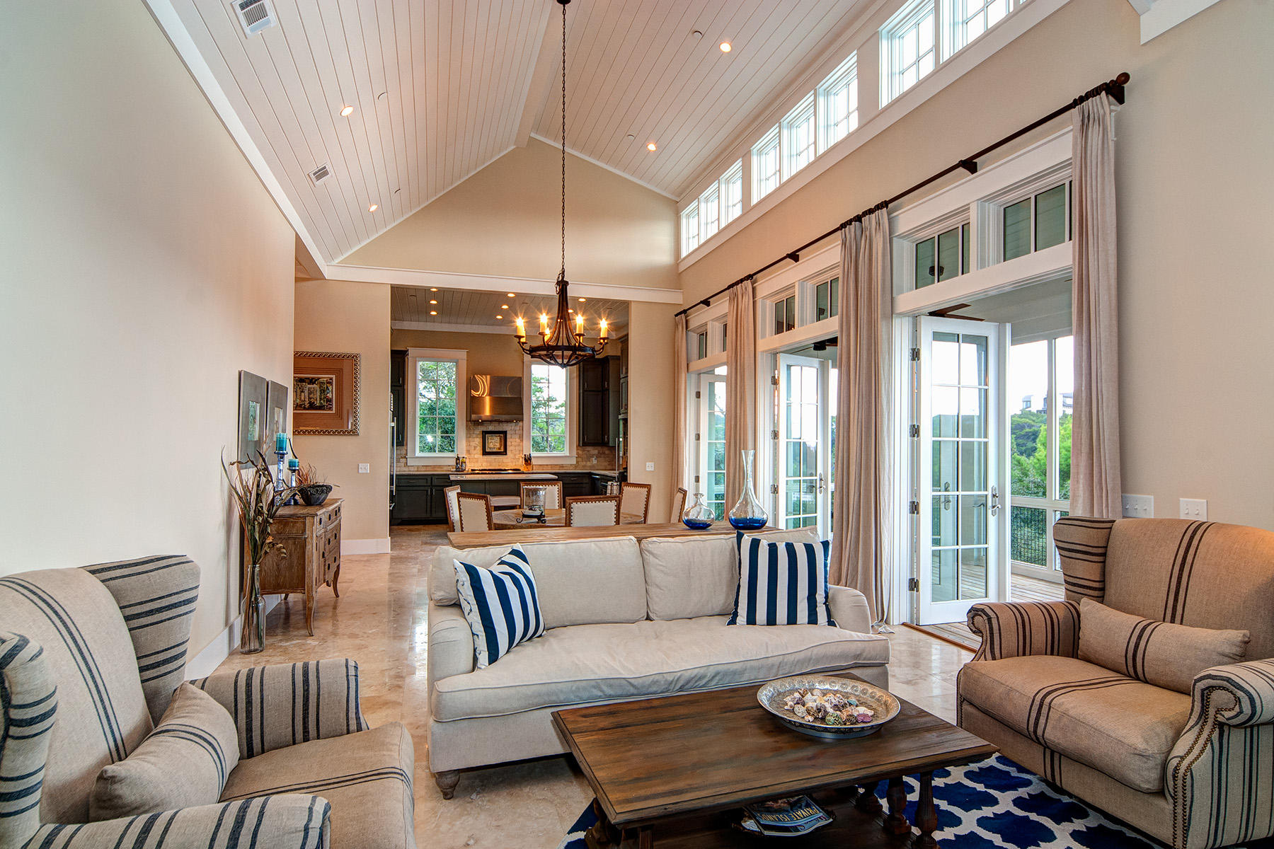 33 Bluff Lane Santa Rosa Beach, FL 32459 - Photo 4 of 37 a living room with furniture ceiling fan and a large window