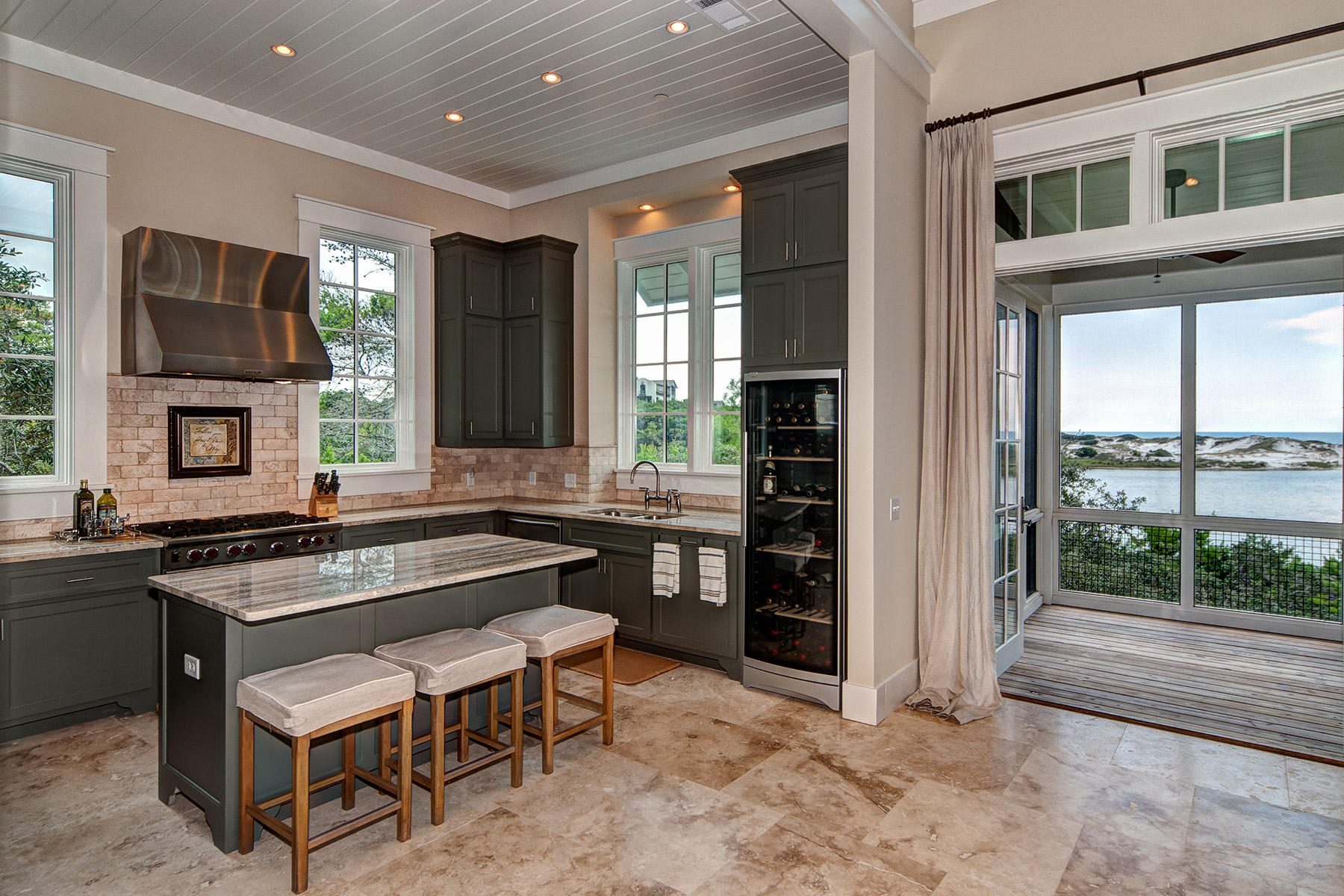 33 Bluff Lane Santa Rosa Beach, FL 32459 - Photo 6 of 37 a kitchen with a stove a sink and a refrigerator