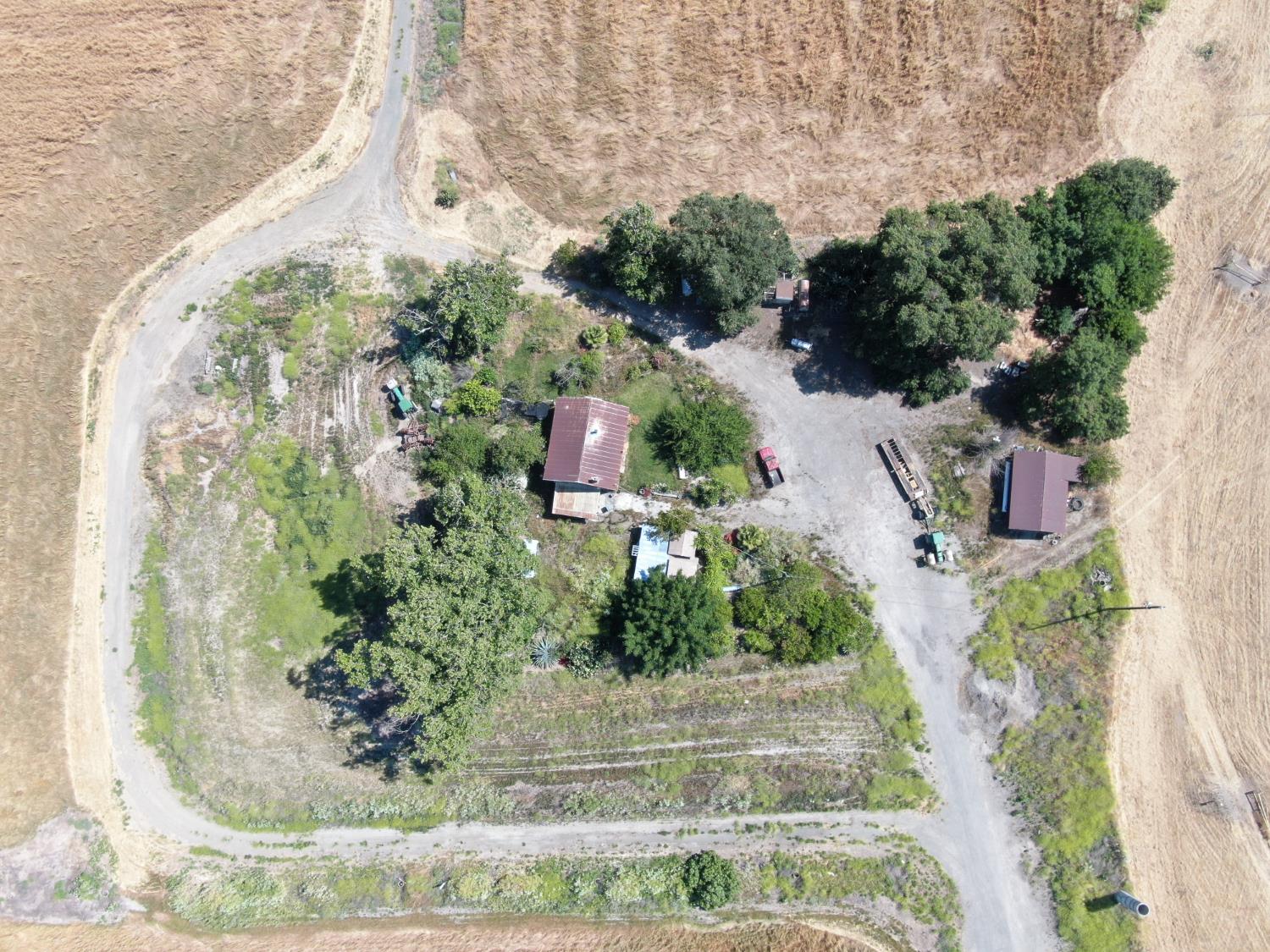 28725 North Vail Road Walnut Grove, CA 95690 - Photo 4 of 7 an aerial view of a house with a yard