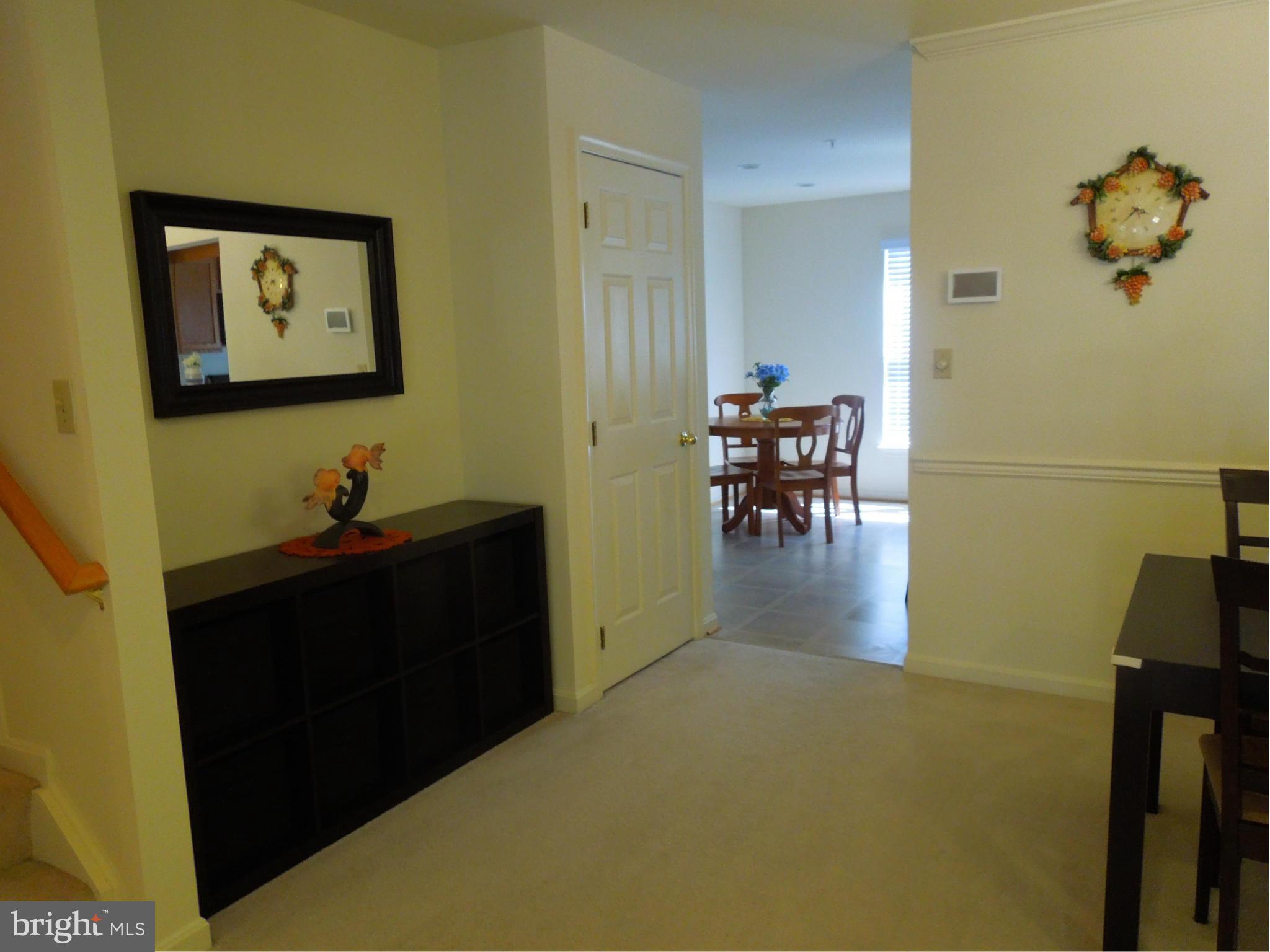 16808 Centerfield Way Olney, MD 20832 - Photo 6 of 22 a living room with furniture