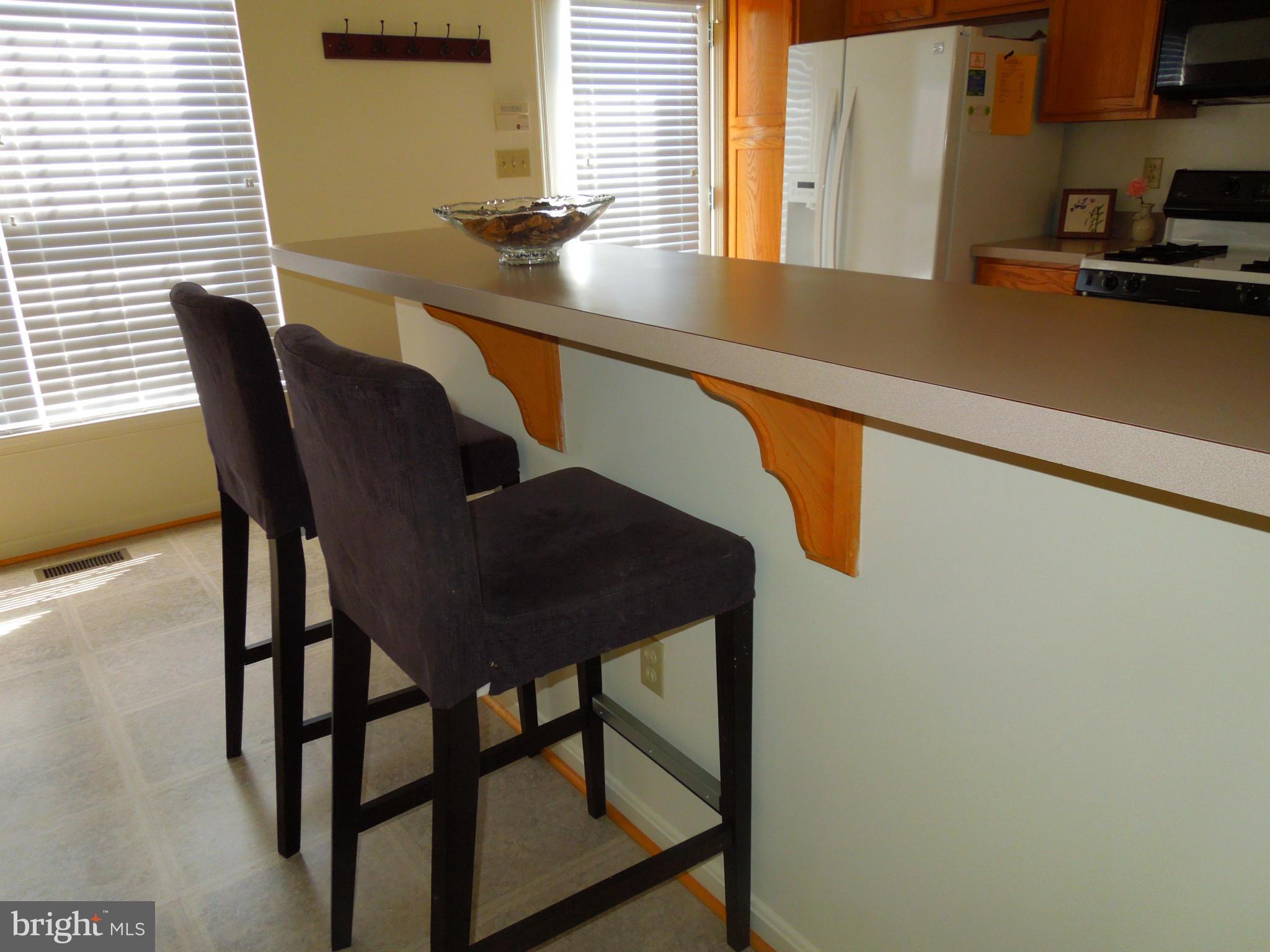 16808 Centerfield Way Olney, MD 20832 - Photo 9 of 22 a view of balcony and chair