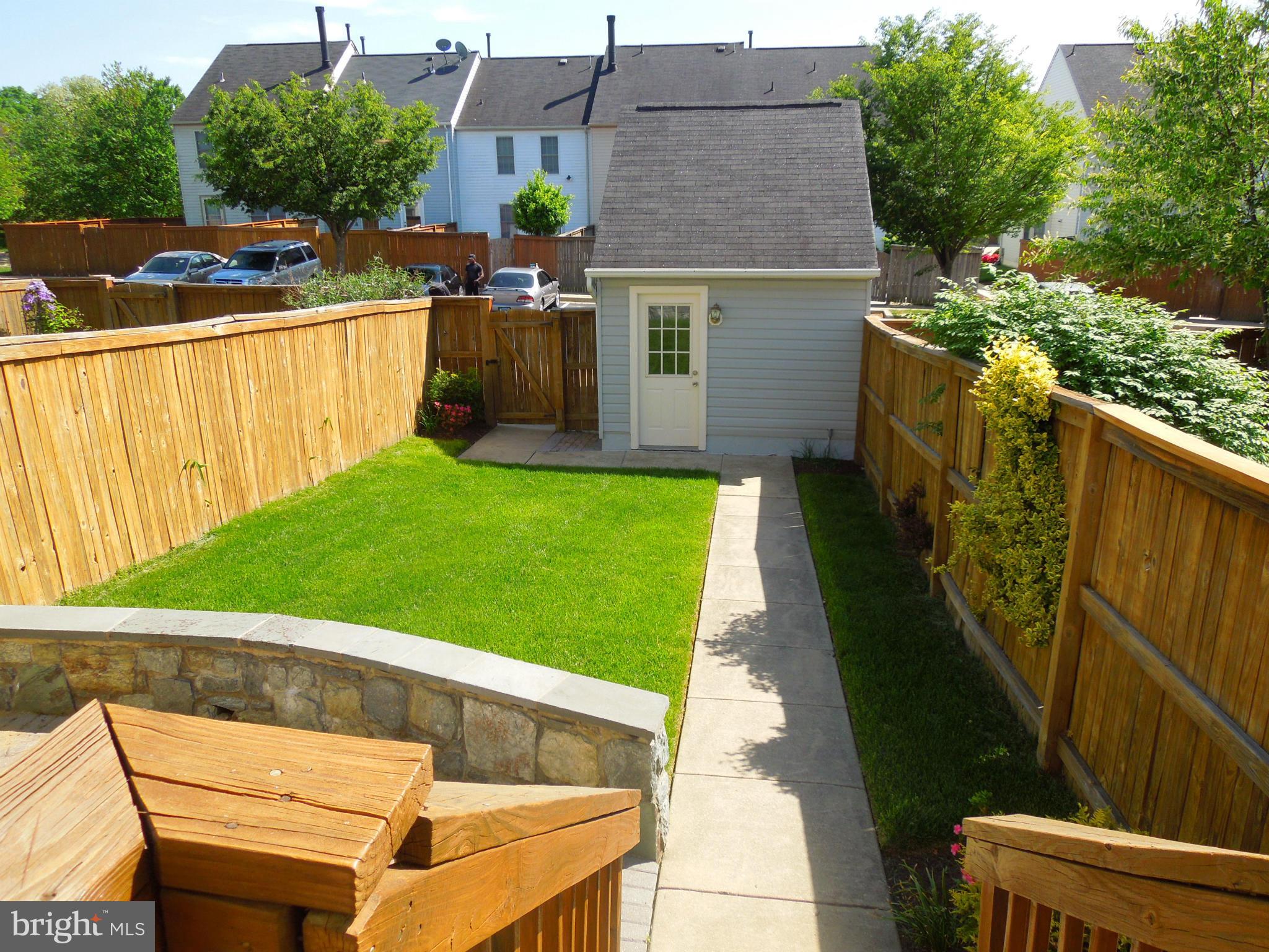 16808 Centerfield Way Olney, MD 20832 - Photo 10 of 22 a view of an outdoor space with seating area