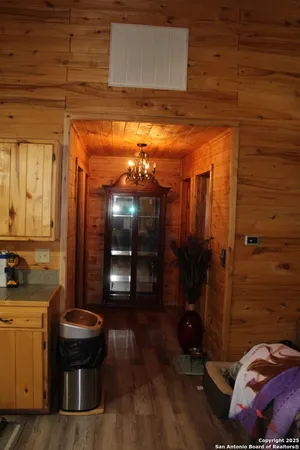 a bathroom with a sink a toilet and shower curtain