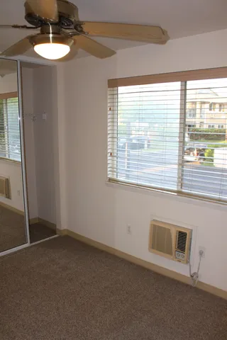 a view of a room that has a window in it