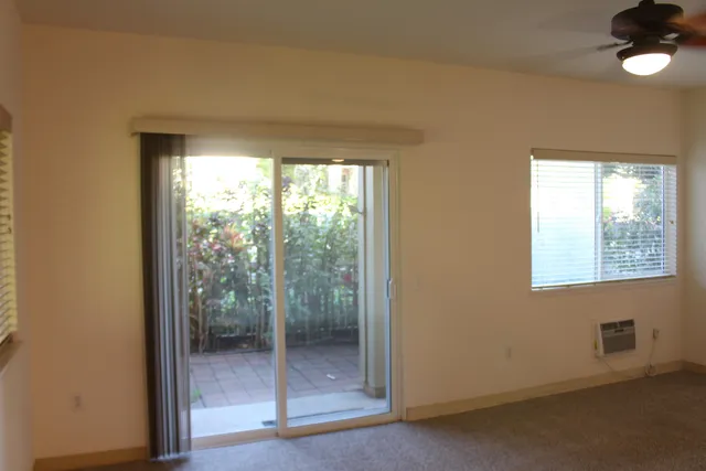 a view of a room that has a window