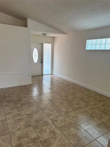 a view of a livingroom with a window