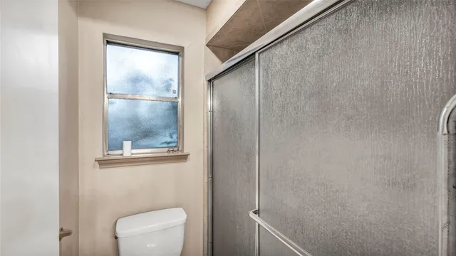 a view of empty room with closet