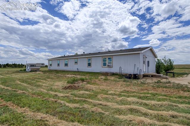 7505 Harding Road Rush, CO 80833 - Photo 23 of 33 BACK SIDE OF HOME