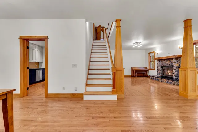 a kitchen with stainless steel appliances granite countertop a stove and a refrigerator