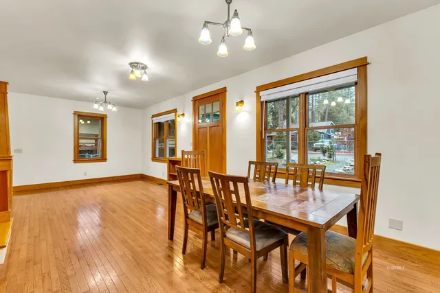 a kitchen with granite countertop cabinets and window