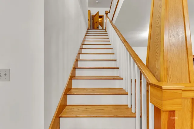 a picture of a bathroom with a shower