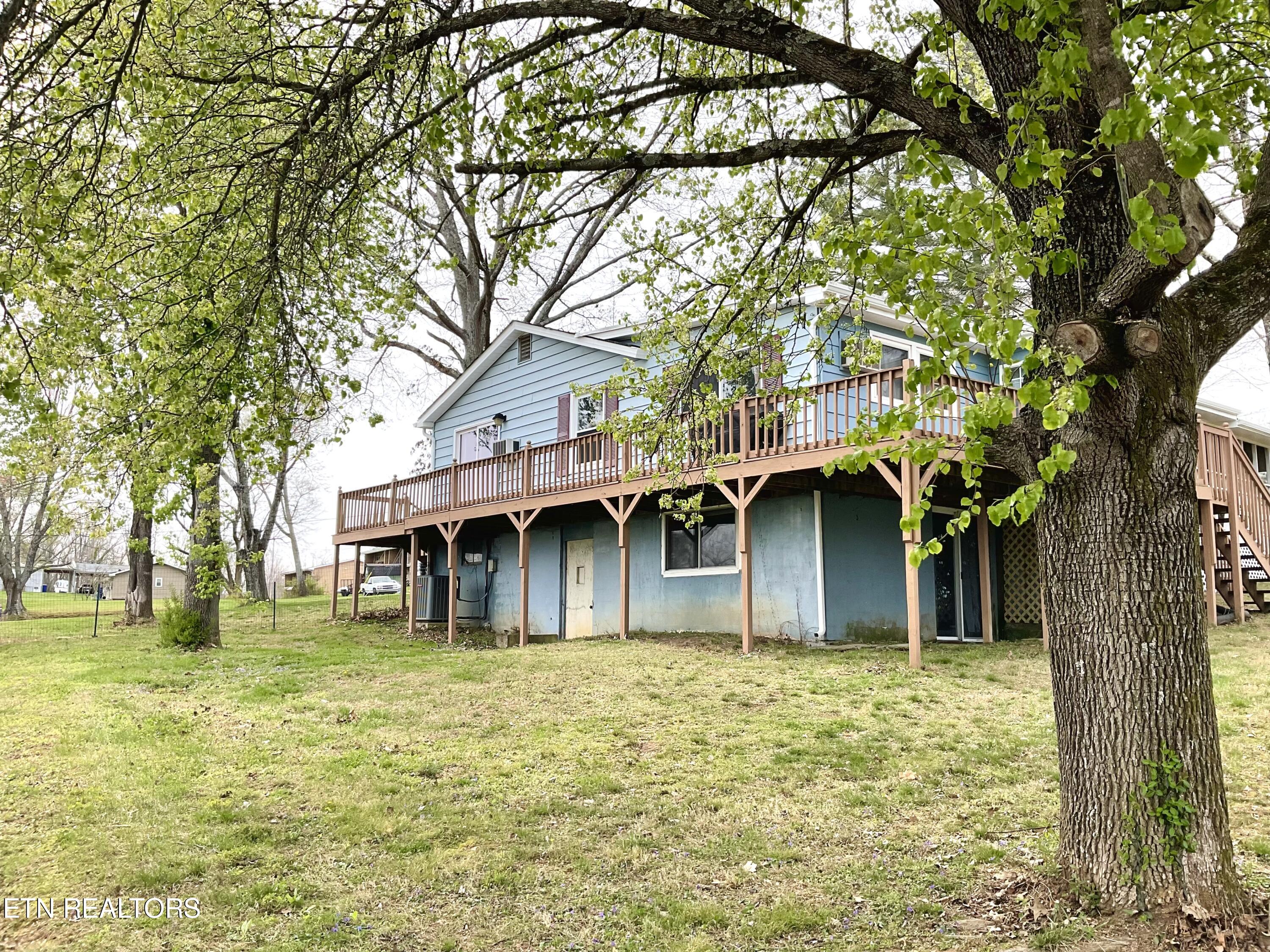 401 Beets Street Clinton, TN 37716 - Photo 26 of 30 Wrap around deck