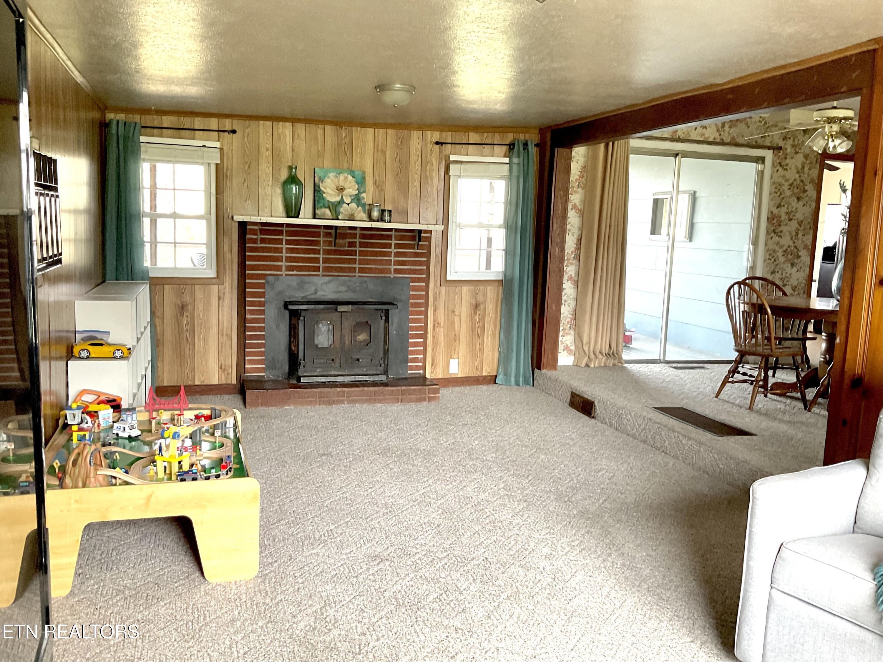 401 Beets Street Clinton, TN 37716 - Photo 8 of 30 Family/Dining to Screen Porch Access
