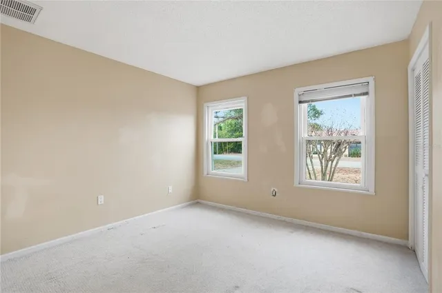 an empty room with windows