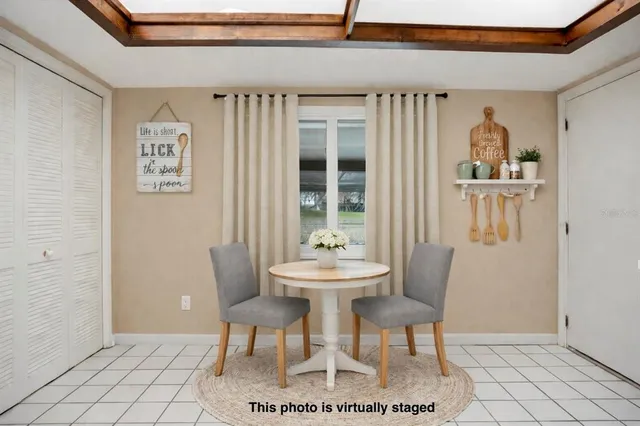 a view of a dining room with furniture