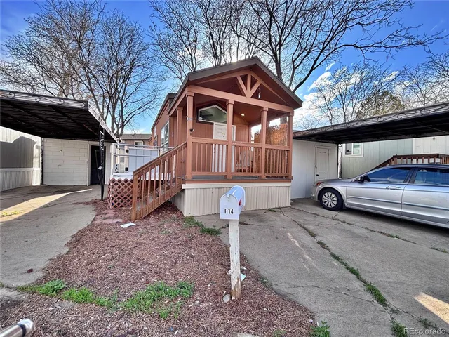 a car parked in front of a house