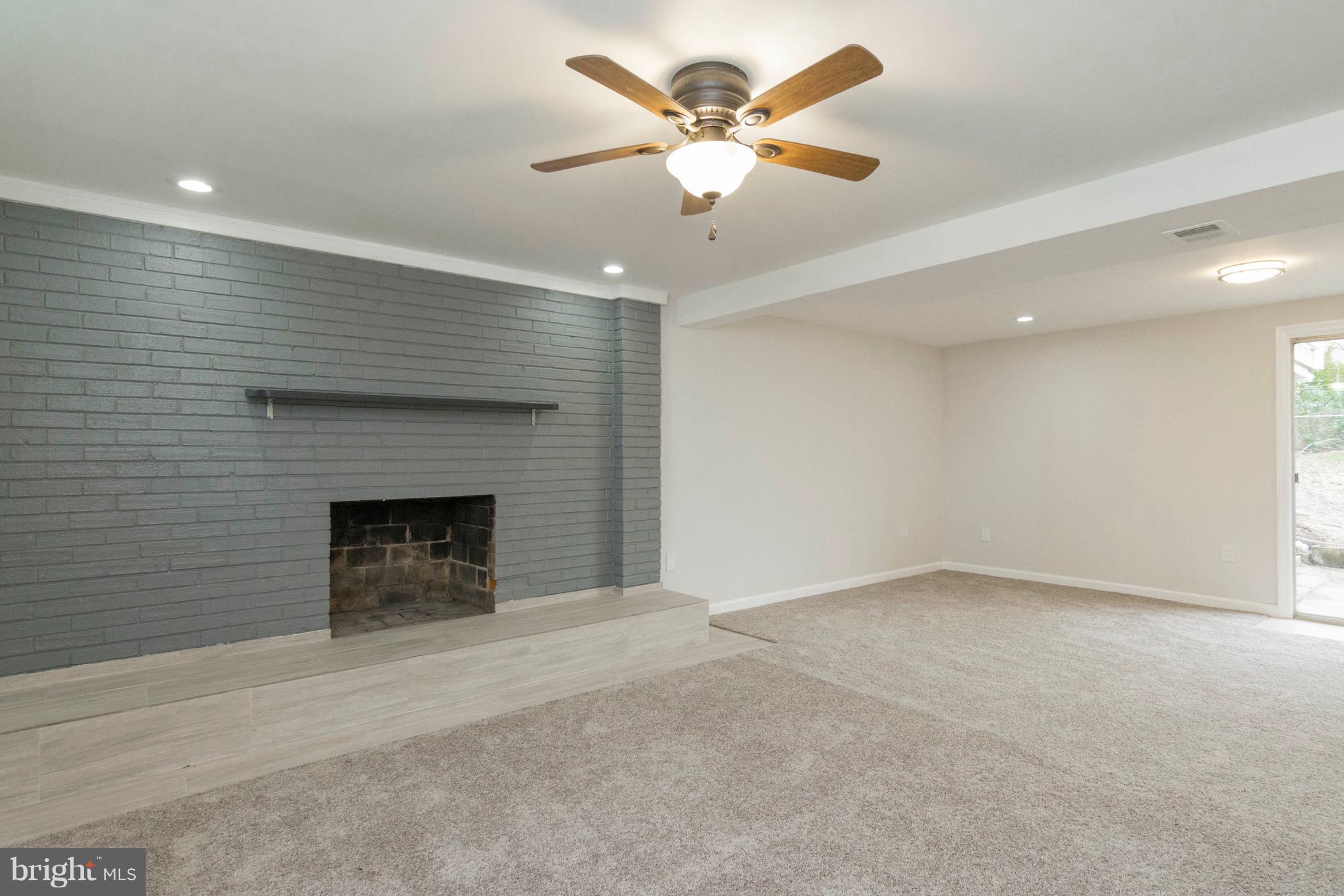 13405 Kingsman Road Woodbridge, VA 22193 - Photo 27 of 42 Finished Basement Rec Room with New Carpet