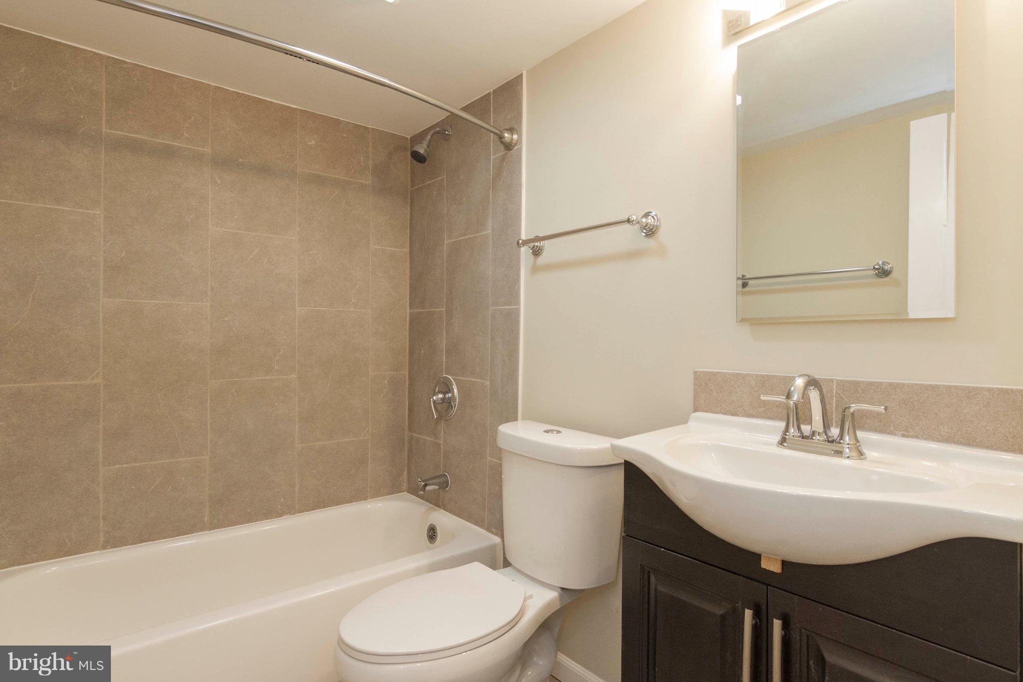 13405 Kingsman Road Woodbridge, VA 22193 - Photo 31 of 42 Remodeled Full Bath in Lower Level