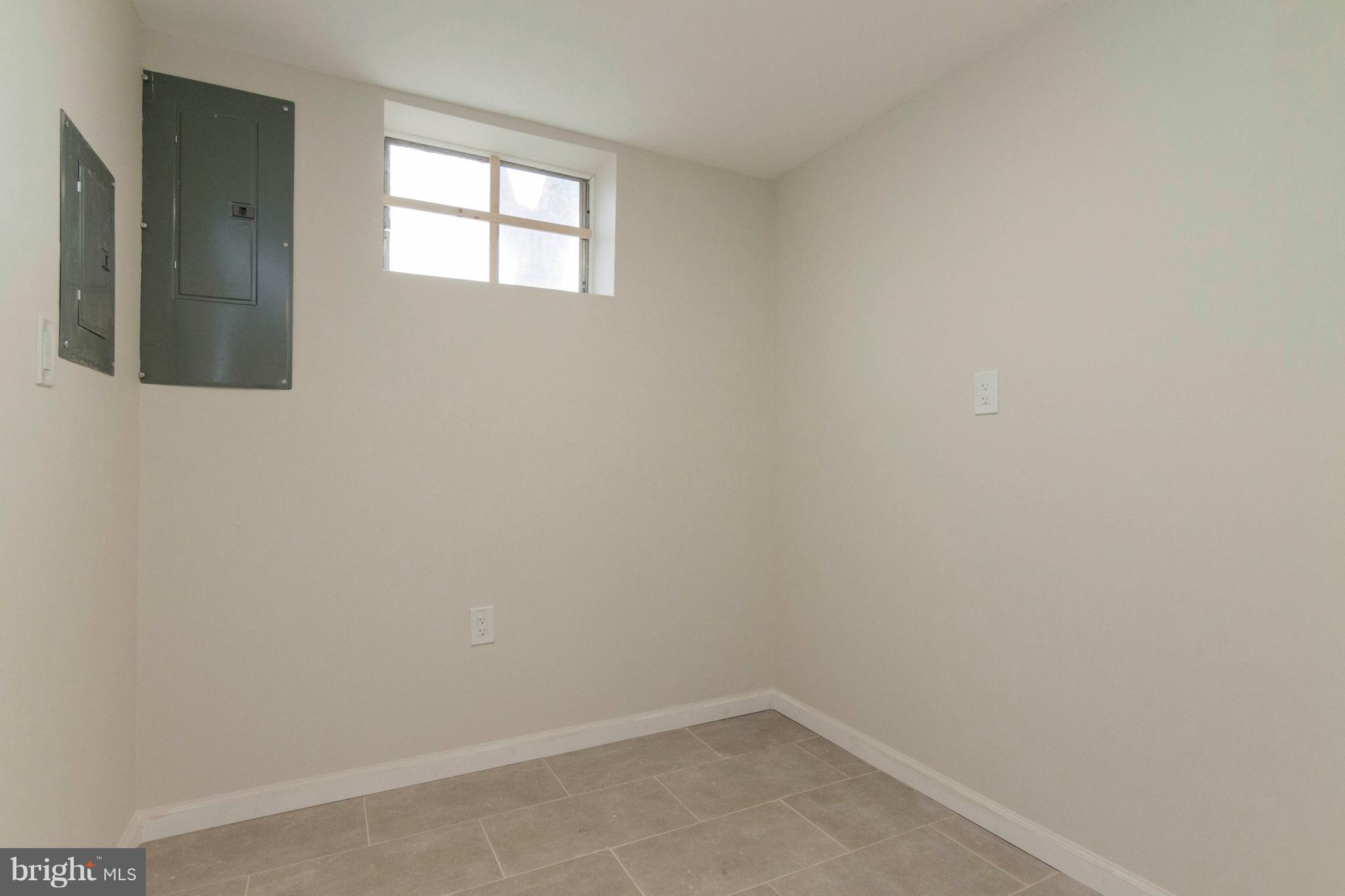 13405 Kingsman Road Woodbridge, VA 22193 - Photo 38 of 42 Bonus Room off the Laundry Area