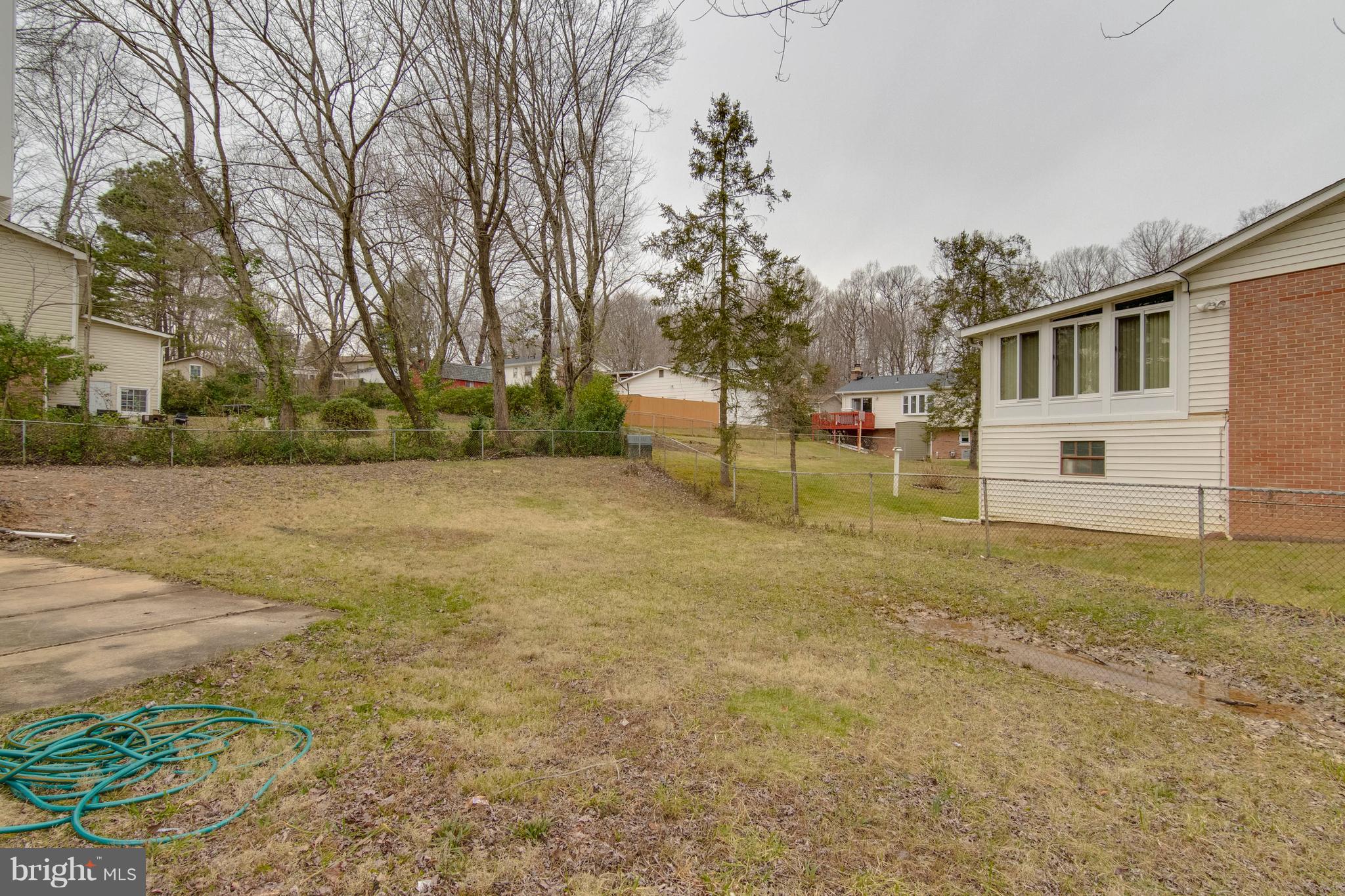 13405 Kingsman Road Woodbridge, VA 22193 - Photo 41 of 42 Rear View with Large Fended Yard