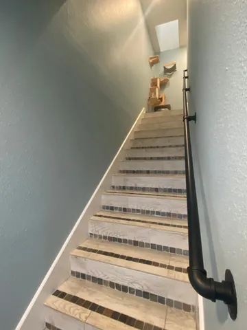 a view of a balcony with wooden floor
