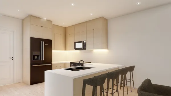 a kitchen that has a sink and a stove in it