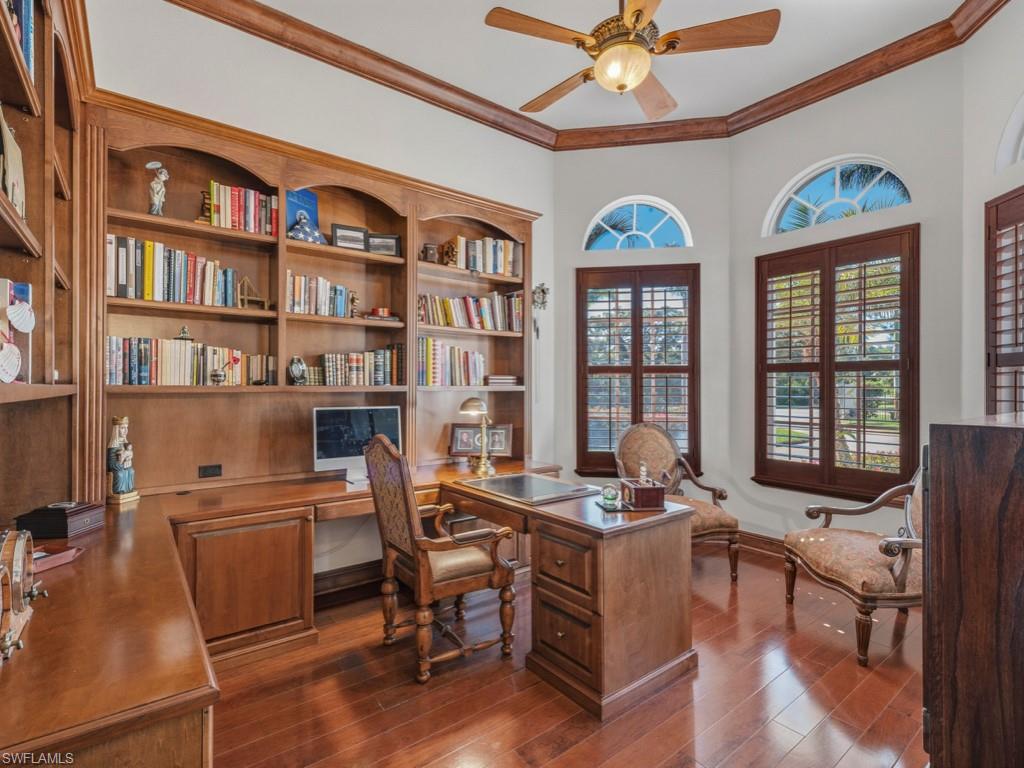 506 Ridge Drive Naples, FL 34108 - Photo 16 of 33 Office with a ceiling fan, dark wood finished floors, and ornamental molding