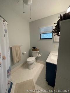 8552 Southwest 17th Avenue Stuart, FL 34997 - Photo 15 of 25 a bathroom with a toilet and a sink