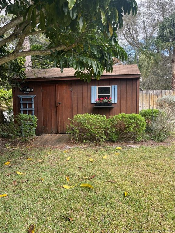 8552 Southwest 17th Avenue Stuart, FL 34997 - Photo 20 of 25 a house view with a outdoor space