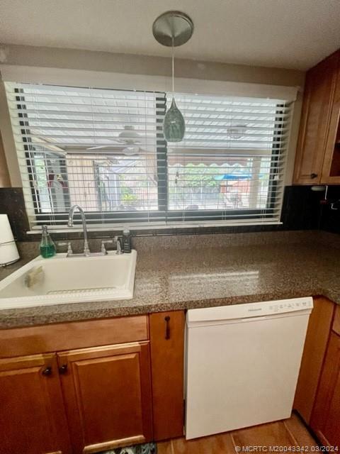 8552 Southwest 17th Avenue Stuart, FL 34997 - Photo 24 of 25 a close view of sink and mirror with bathtub