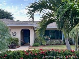 8552 Southwest 17th Avenue Stuart, FL 34997 - Photo 3 of 25 a view of a yard with a plants
